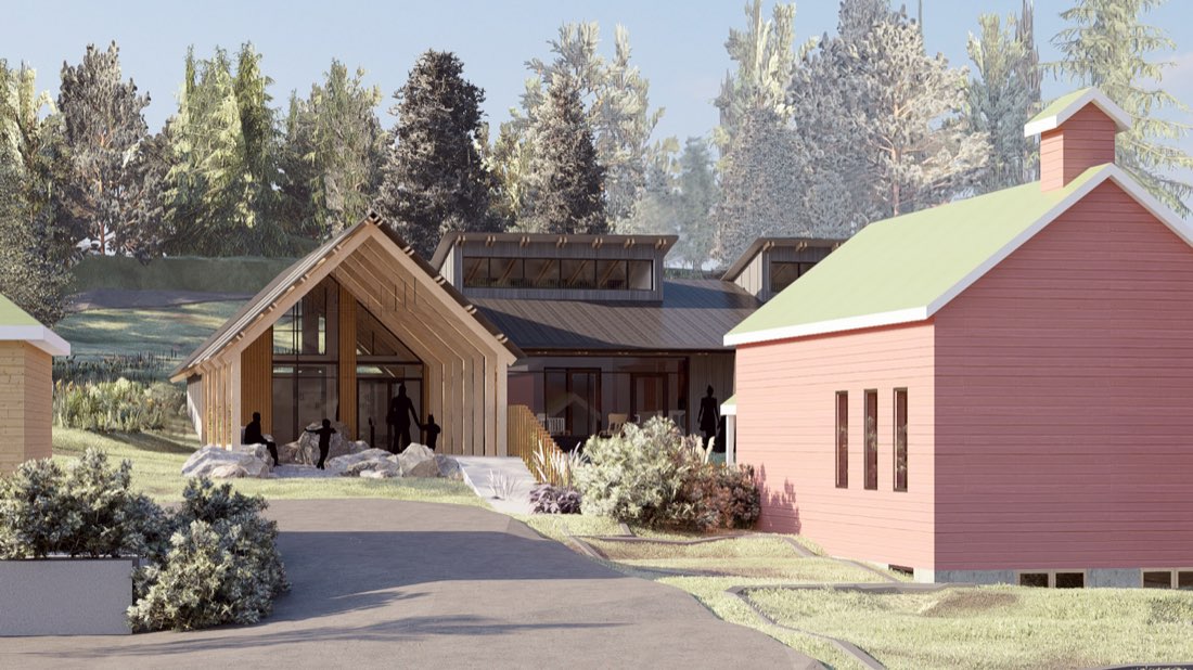 Rendering of the new school seen from Owl Creek Road, with the historic red schoolhouse in front